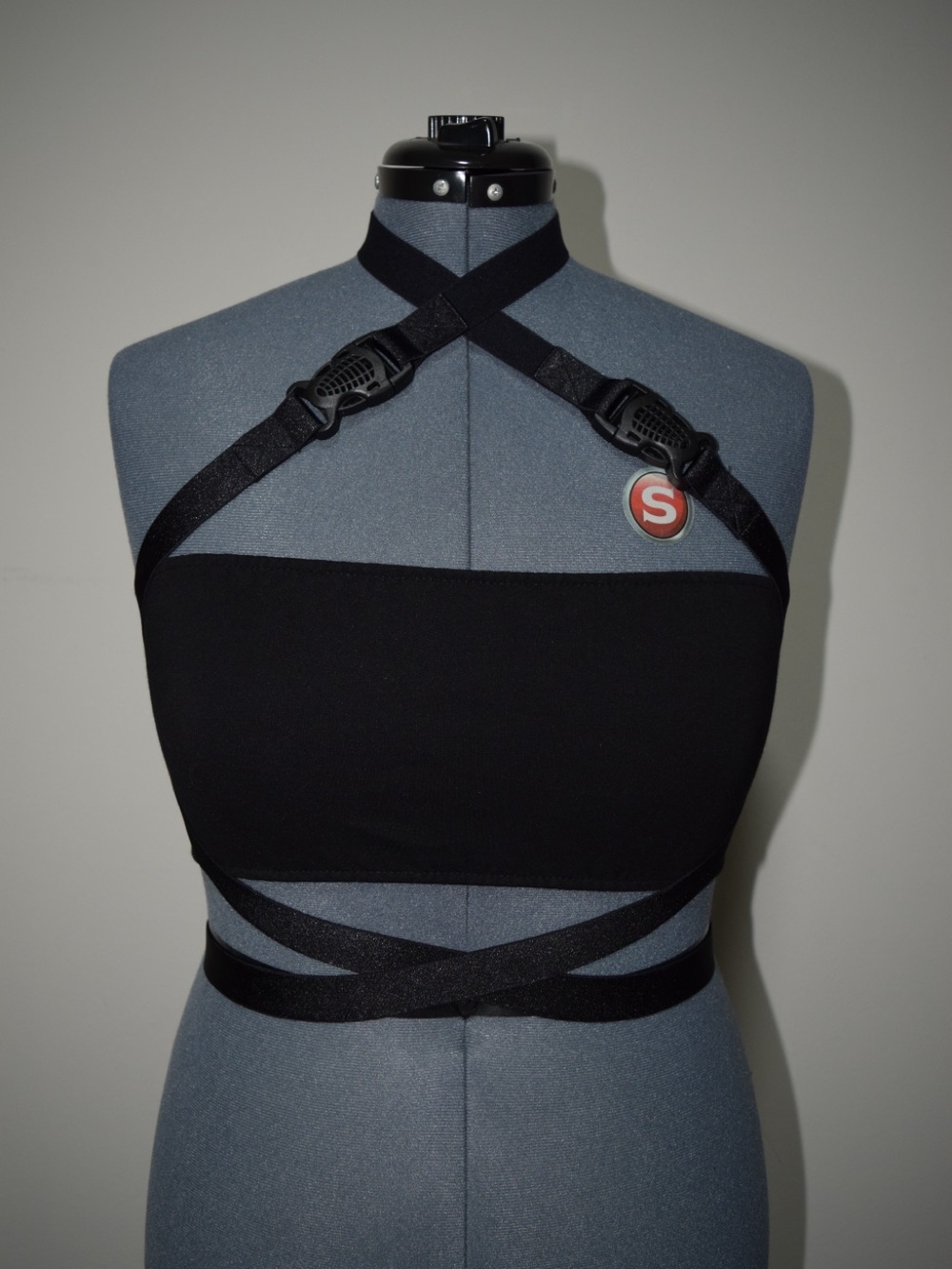 POSTER GIRL Dolls Kill Women’s Black Buckle Strap Crop Top